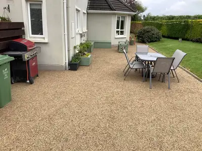 image of house with tar and chip driveway installed.