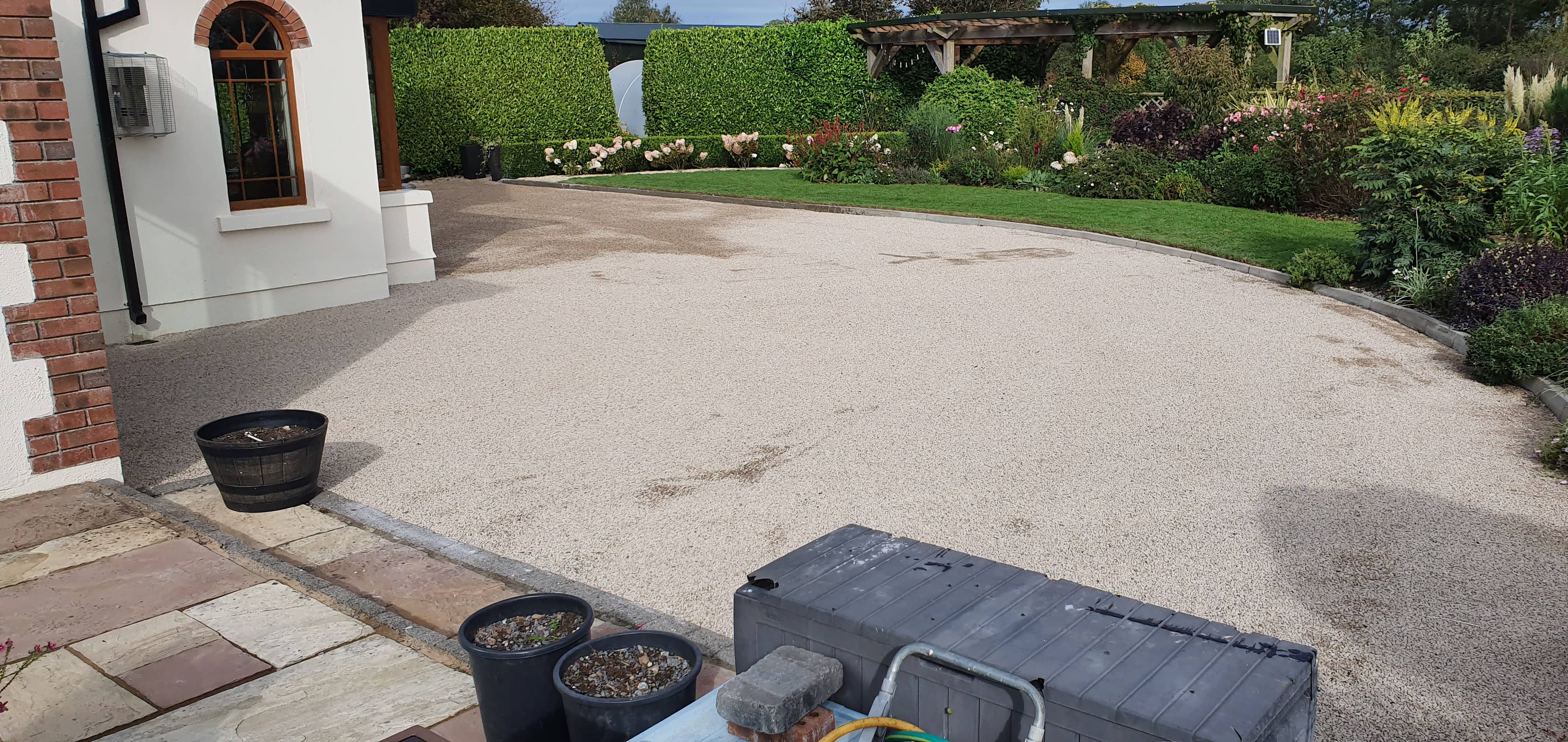 Photo of a tar and chip driveway installation outside a house in Co. Tipperary.